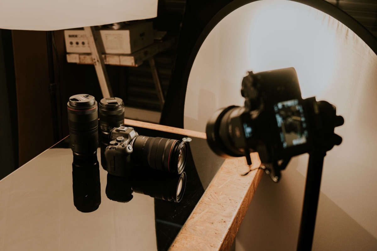 mirrorless camera with lens in professional setup